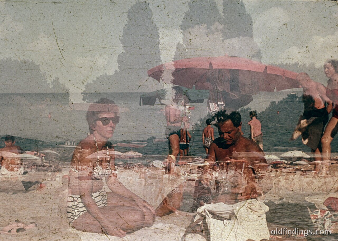 Vintage seaside scene with faded polaroid texture, featuring mid-20th century beachgoers in swimwear. A woman in sunglasses reclines on a woven mat, while a man in a striped shirt sits beside her. A red umbrella provides shade over a group near the water’s edge. Beach towels, sand, and shallow waves complete the composition.