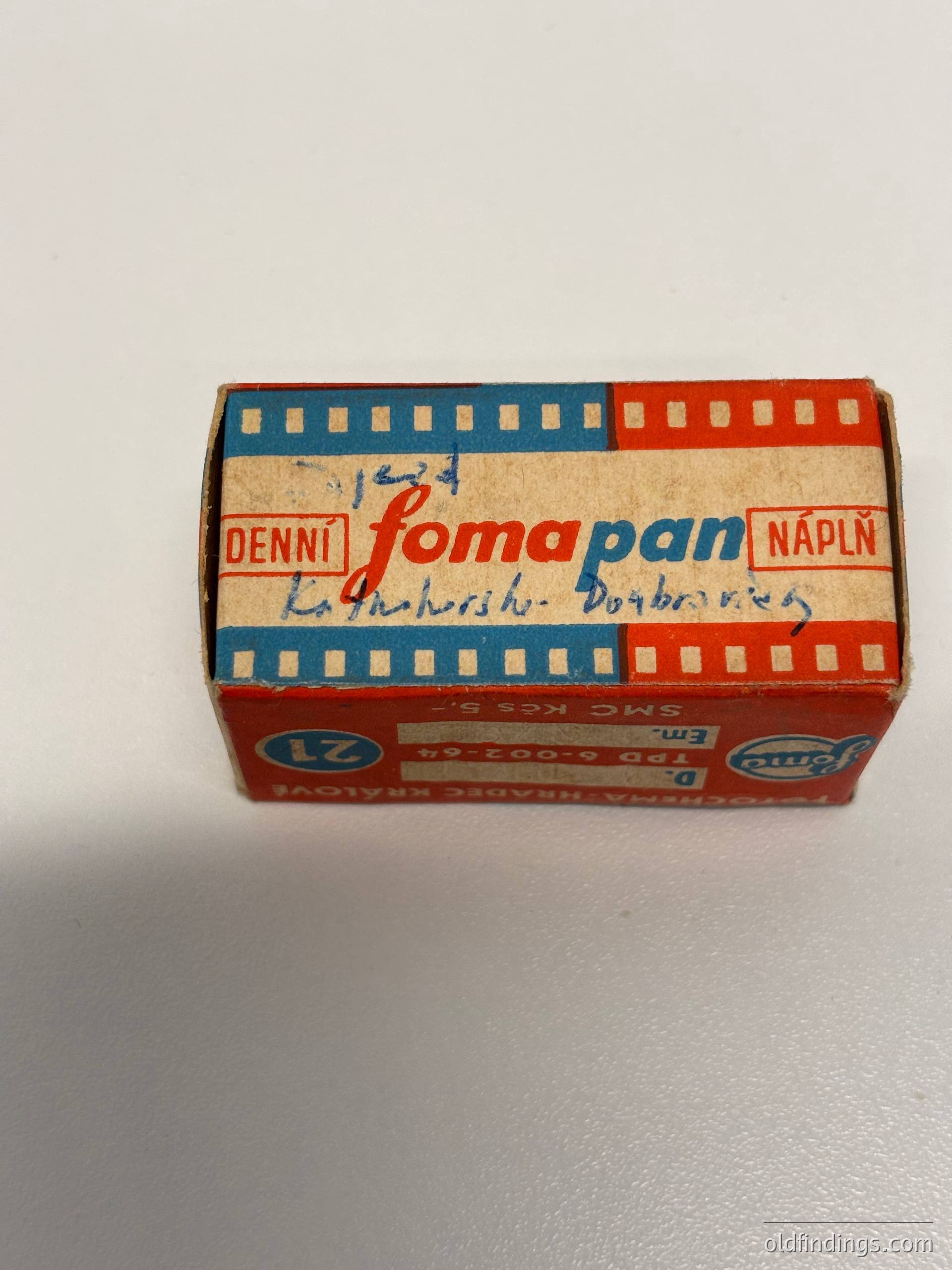 Vintage **SomaPan** 120 film canister (24-exposure) with Czech/Slovak branding, dated ~1960s–70s. Features handwritten notes in Cyrillic ("Lašveriš-Dobšiná") and red/blue/white color scheme. Ideal for retro photography, film history, or nostalgic design references.