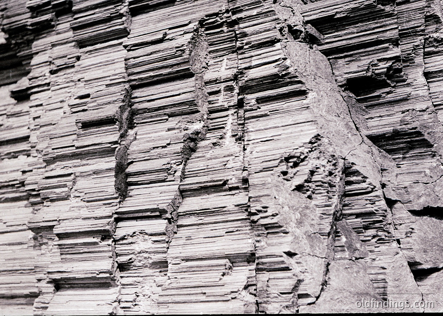 Close-up of weathered brickwork showing cracked mortar and eroded edges, likely from a historic European building. The layered, uneven texture suggests age and exposure to elements. Potential architectural reference for restoration or design studies.