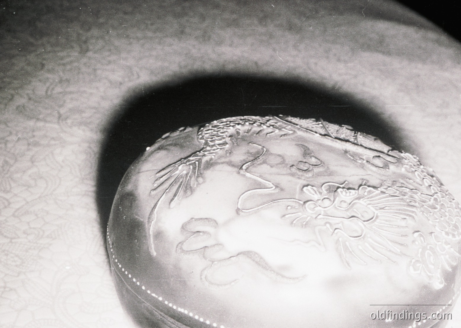 Vintage silver-plated oval dish with intricate relief engraving of a lion and floral motifs, likely 19th–early 20th century. Art Nouveau-inspired design suggests European craftsmanship, possibly for formal dining or decorative use.