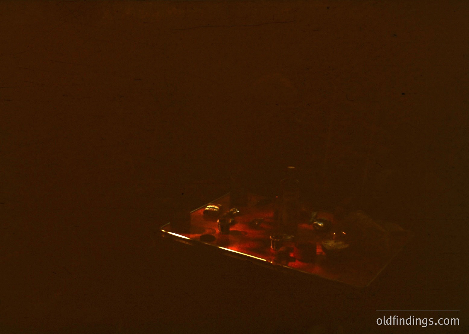 Vintage military tank silhouette against low-light backdrop, likely mid-20th century. Blurred details suggest motion or low-resolution capture. Potential historical or stock reference for wartime/armored vehicle research.