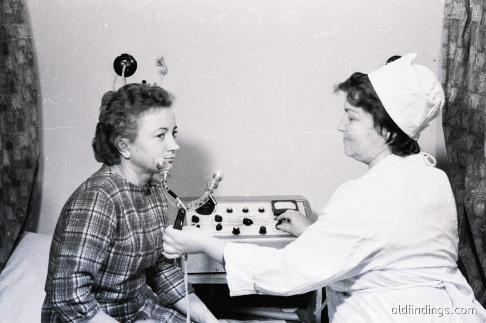 Mid-20th century dental clinic scene: a seated patient receives treatment via a manual dental drill. Nurse in cap and uniform assists, holding a tray of tools. Plain exam room with wall-mounted clock. Reflects 1950s–1960s dental hygiene practices.