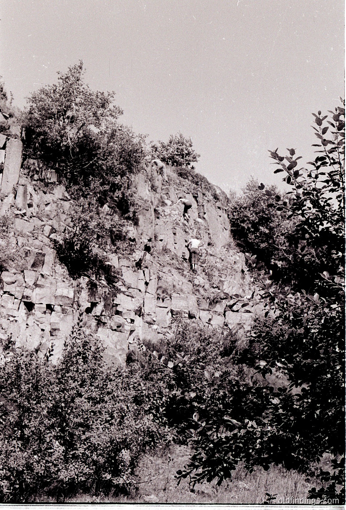 Ancient stone fortress ruins with weathered walls and overgrown vegetation. Likely Eastern European, possibly ’s region. Mid-20th century black-and-white photograph.