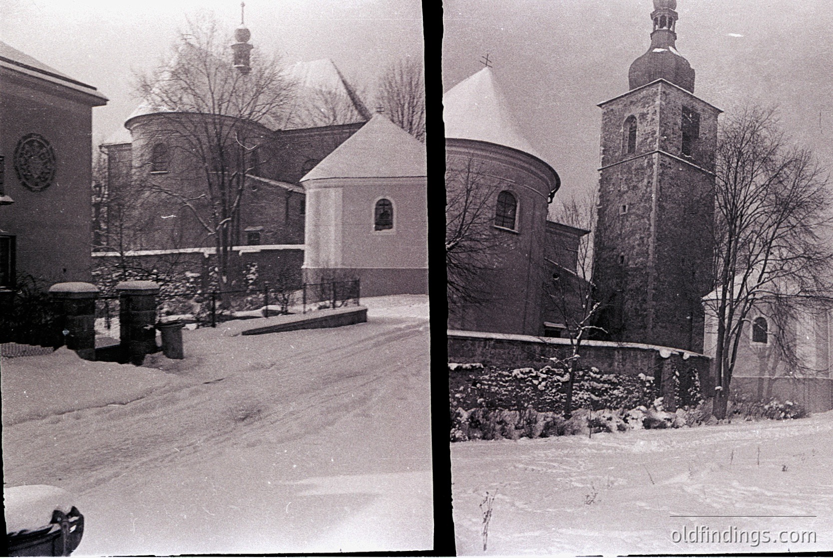 Historic Orthodox church complex blanketed in snow, featuring a domed chapel and bell tower with cross. Snow-covered courtyard and stone pathways suggest Eastern European winter architecture, likely –. Distinctive Byzantine-style domes and weathered stonework indicate cultural heritage.