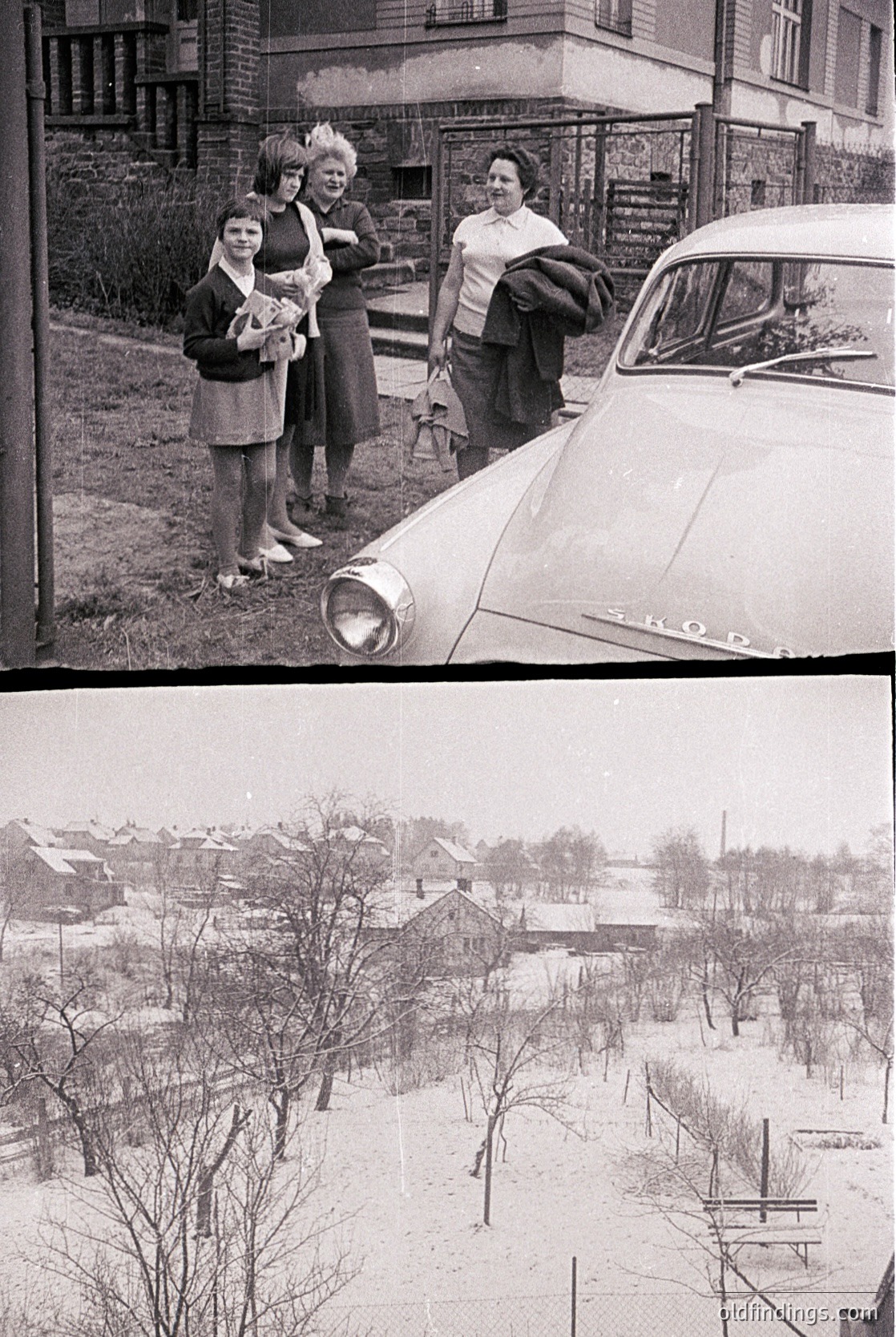 Vintage black-and-white photo of three women posing beside a classic car (likely a Škoda) in a residential neighborhood. Snow covers the ground, indicating winter. The women wear 1960s-era dresses and coats, with one holding a baby. Background shows bare trees and modest brick houses.