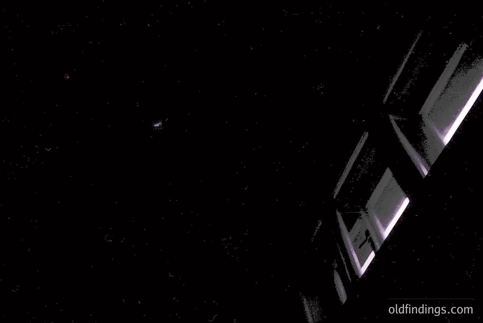 Minimalist geometric sculpture in dark space, featuring angular, reflective metal panels arranged in a staggered, floating formation. The composition emphasizes sharp lines and contrast against a void background. Ideal for modern design references or abstract art studies.