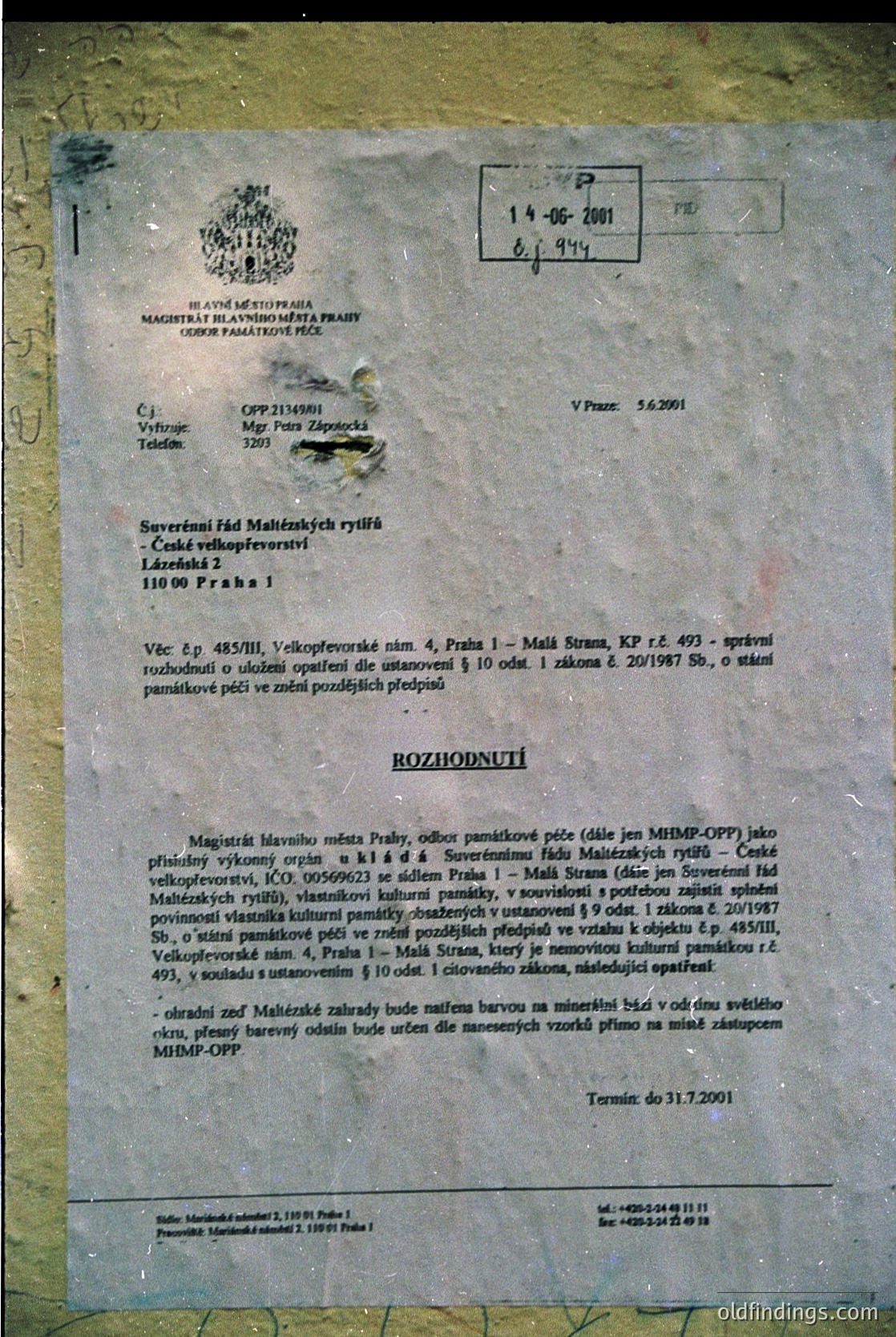 A yellowed, stamped document from **Czech Republic** (likely **Prague**) dated **May 5, 2001**. Features official seals, handwritten notes, and text in Czech regarding **cultural heritage preservation** of the **Malá Strana** area, referencing **CZP 214961** and **E. 485/93**. Includes a **1997 sale agreement** for a historic building, likely from the **1960s-1970s** era.
