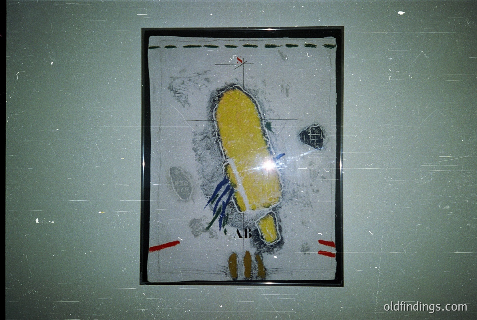 Vintage framed map or architectural diagram depicting a yellow-roofed, elongated structure with blue accents, likely a building or site plan. Stains and wear suggest age, possibly from a 1970s–1990s office or institutional setting. Useful for historical research or design references.