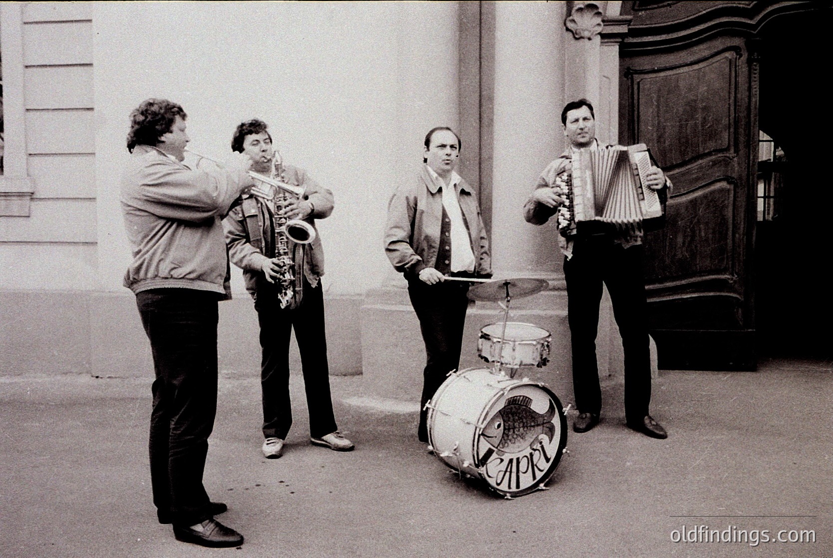 Street jazz quartet in mid-performance, 1960s–1970s. Saxophonist, accordionist, drummer (with Cyrillic "ЦЕР" on drum), and conductor outside a Soviet-era building. Urban street scene with muted tones and candid energy.