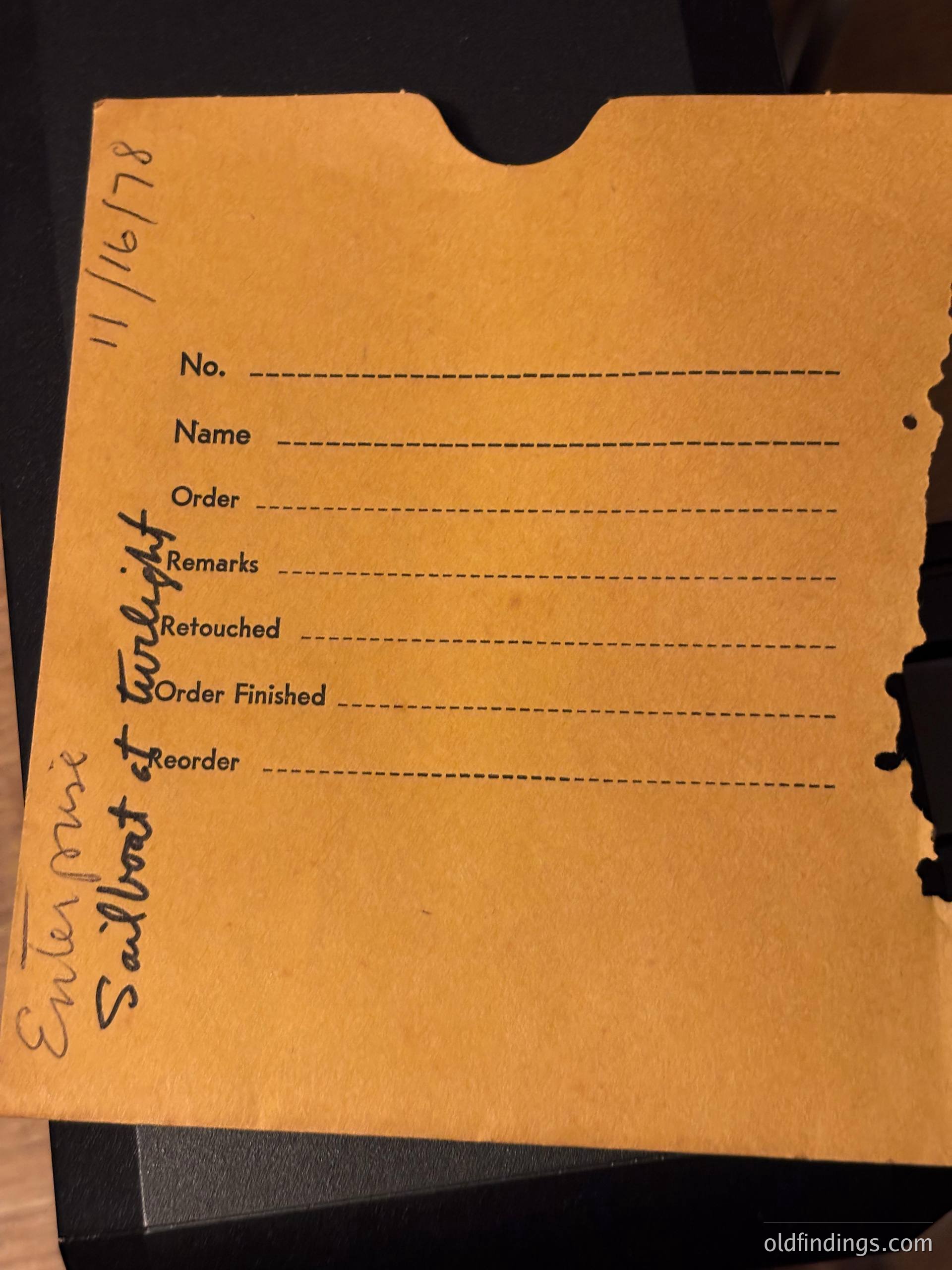 Vintage photo order form dated **11/16/78** for *"Sailboat at Twilight"*—handwritten on aged kraft paper. Includes fields for order details, retouching notes, and status tracking. Reflects mid-1970s photography workflows.