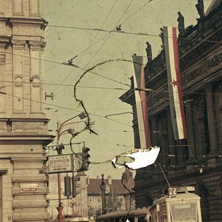 Vintage city scene with damaged tram and downed wires.
