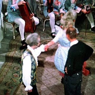 Historic dance performance with period costumes.