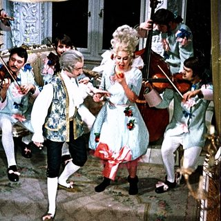 Eighteenth-century costume dance with string musicians.