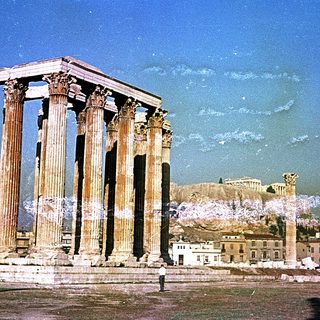 Ancient Greek temple ruins with classical columns.