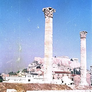 Ancient Greek columns in Athens ruins.