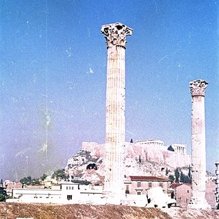Ancient Greek columns in Athens ruins.
