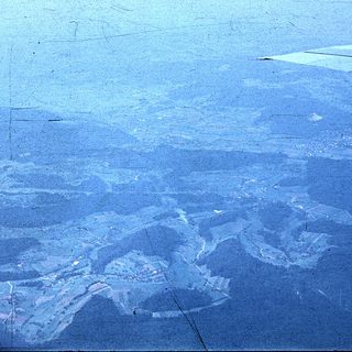 Aerial view of desert with dry riverbeds.