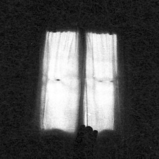Two parallel white lines on dark background.