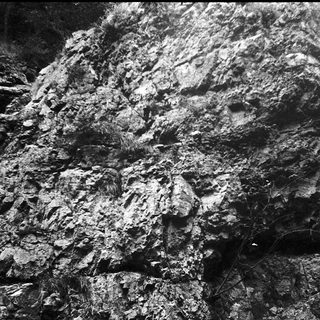 Rough, jagged volcanic rock formation.