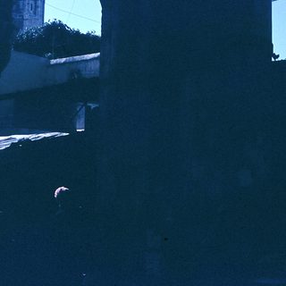Dark interior with faint outdoor light.
