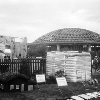 Eco-friendly dome exhibit with recycled materials display.
