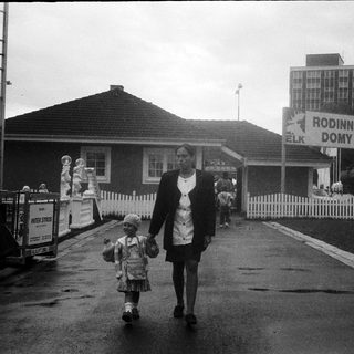 Family walking near family housing complex.