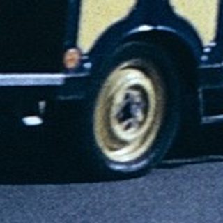 Vintage street festival with yellow "Frühlingsexpress" ride.