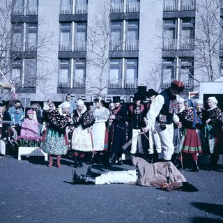 Traditional folk dance performance in cultural attire.