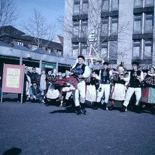 Traditional folk dance performance with colorful costumes.