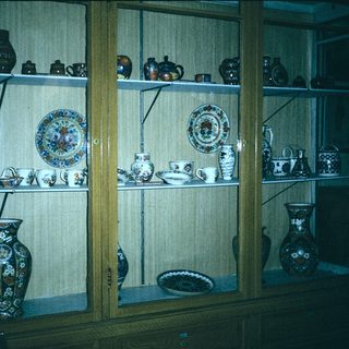 Vintage ceramic and porcelain display case.