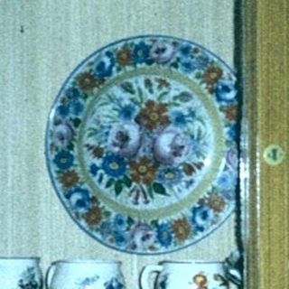 Vintage ceramic and porcelain display case.