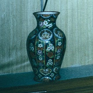 Vintage ceramic and porcelain display case.