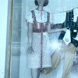 Traditional Czech folk clothing store display.