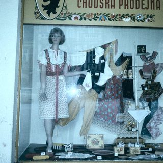 Traditional Czech folk clothing store display.