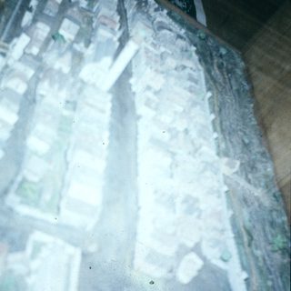 Snow-covered urban landscape from aerial view.