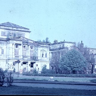 Neoclassical building with columns and balustrades.
