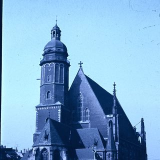 Historic church with tall bell tower.