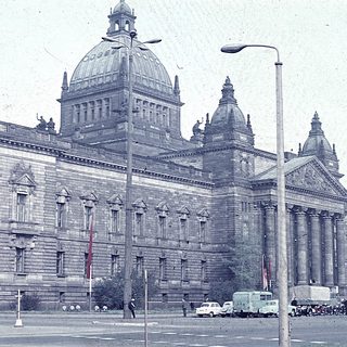 Grand historic building with neoclassical architecture and domes.