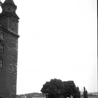 Historic stone tower with medieval architectural features.