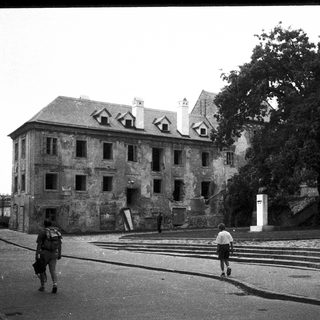 Abandoned historic building with damaged walls.