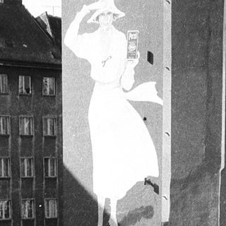 Persil laundry detergent billboard in urban setting.