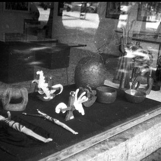 Vintage shop display with vintage bicycles and kitchenware.