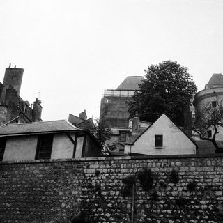 Historic stone buildings with medieval architectural features.
