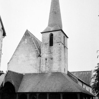 Dilapidated church steeple with visible wear.