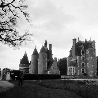 Medieval castle with turrets and fortified walls.