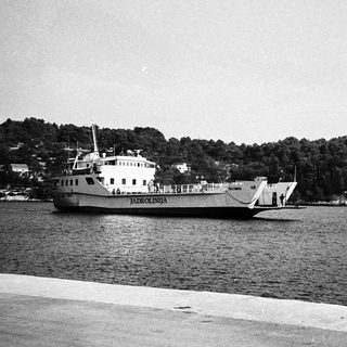 Ferry boat named "Pärnu-Lennuk" crossing calm waters.