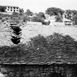 Large crack in ancient stone structure.