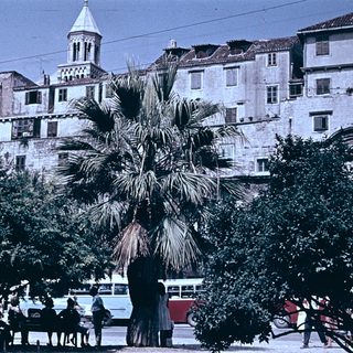 Historic coastal town with Mediterranean architecture.