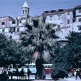 Historic coastal town with Mediterranean architecture.