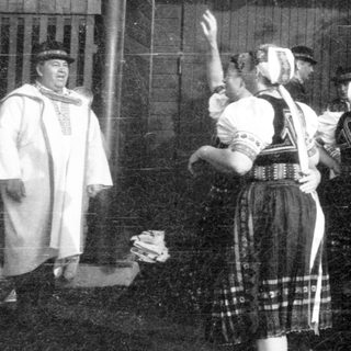 Traditional swordplay demonstration with historical attire.